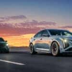 2025 Cadillac CT5 driving on a highway at sunset