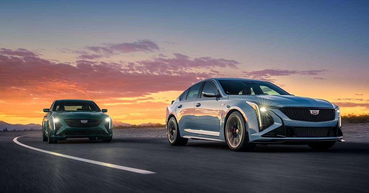 2025 Cadillac CT5 driving on a highway at sunset