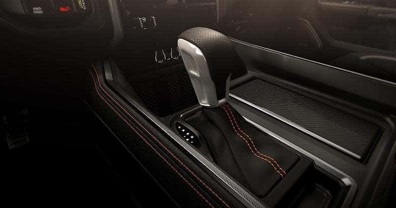 Console-mounted shifter and performance seat stitching in the Rumble Bee.