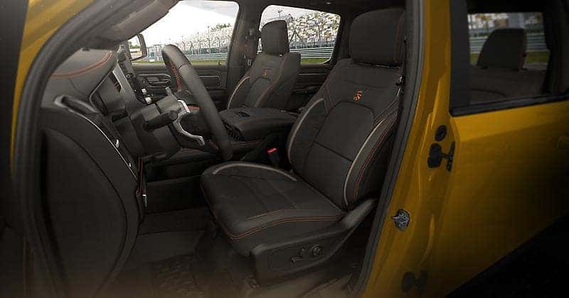 Ram 1500 Rumble Bee interior with bucket seats and console shifter.