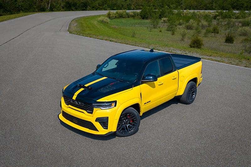 Ram 1500 Rumble Bee profile showing widened fenders and 22-inch aluminum wheels.