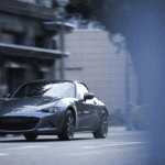 2020 Mazda Miata dark blue sports car in city setting