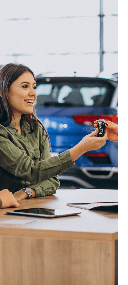 Defining APR at CMA's Toyota of Martinsburg in Martinsburg, WV | Sales person handing over new car keys to customer