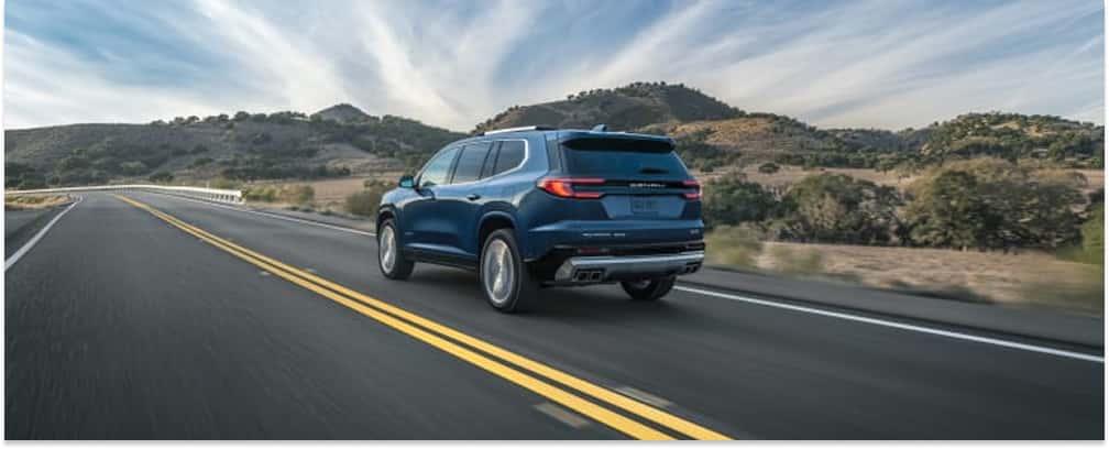 2026 GMC Acadia Driving On Road
