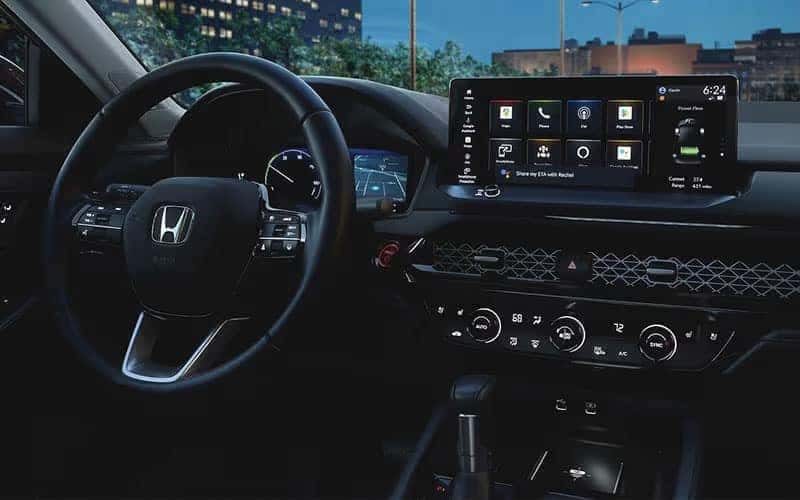 2026 Accord Hybrid interior with 12.3-inch touchscreen and physical HVAC controls