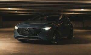 Mazda sedan in parking structure