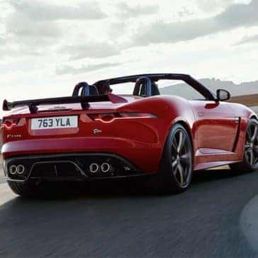 2020-Jaguar-F-TYPE-SVR-Convertible-in-Caldera-Red-driving-around-corner