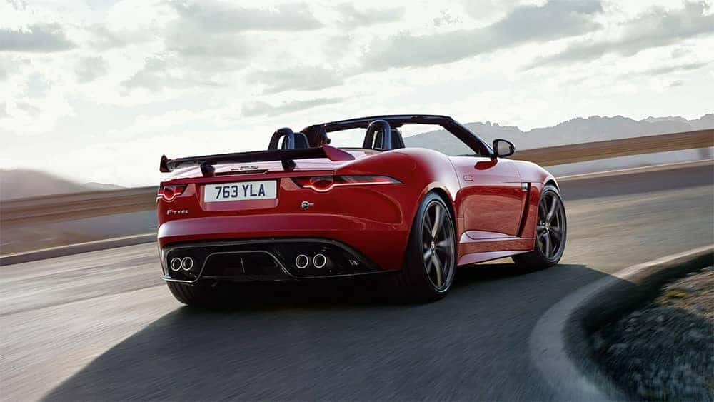 2020-Jaguar-F-TYPE-SVR-Convertible-in-Caldera-Red-driving-around-corner