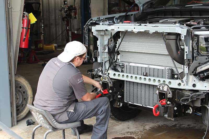 Mechanic working on car