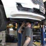 GMC Denali SUV on a lift in the Jim Taylor Buick GMC service department in Monroe, LA