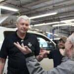 Service advisor talking with a customer in the Jim Taylor Buick GMC service department in Monroe, Louisiana
