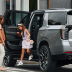 2026 Chevy Suburban parked as family exits the vehicle