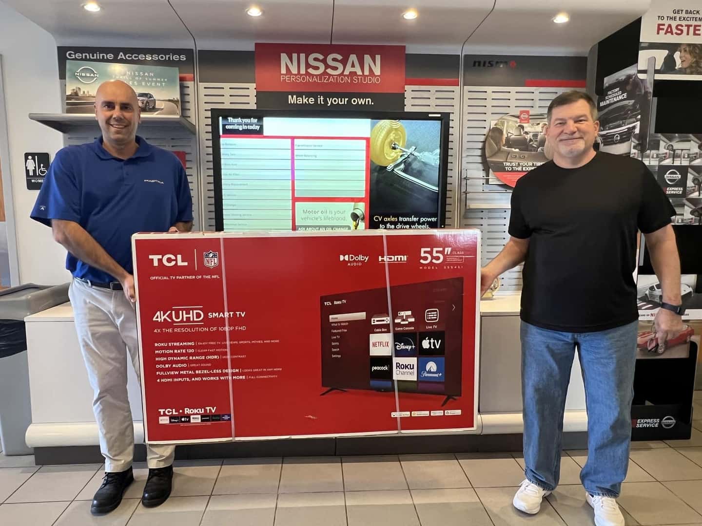 Photograph shared by Mastria Nissan showing a community giveaway or presentation