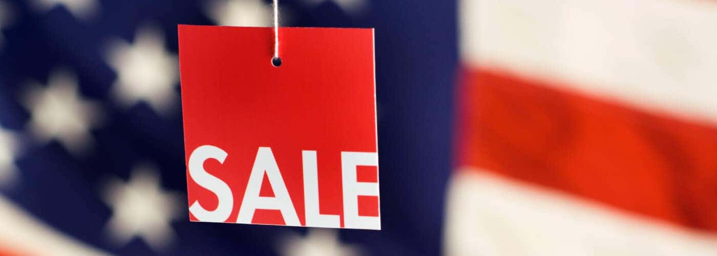 American flag with sale tag