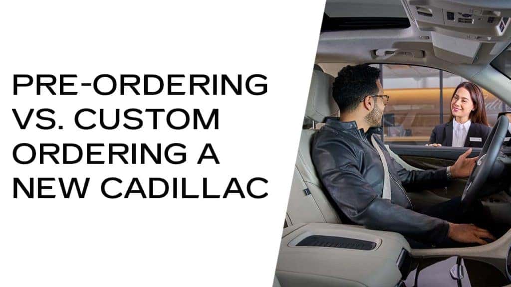 Patrick Cadillac client advisor speaks with customer