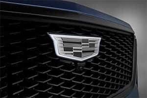 Illuminated Cadillac Crest on the 2025 Escalade grille, adding a bold and sophisticated touch.