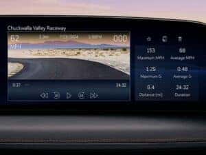 Close-up of the 2025 Cadillac CT5-V Performance Data Recorder interface, displaying real-time driving metrics such as speed, lap times, and G-forces for track-inspired performance analysis.