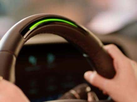 Interior view of the 2025 Cadillac CT5-V with Super Cruise™ activated, showcasing hands-free driving technology on compatible highways with a focus on driver convenience and cutting-edge innovation.