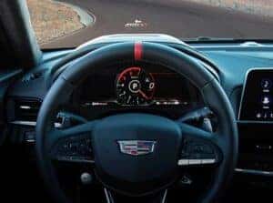 2025 Cadillac CT4-V Head-Up Display projecting key driving information onto the windshield for enhanced visibility and driver focus.