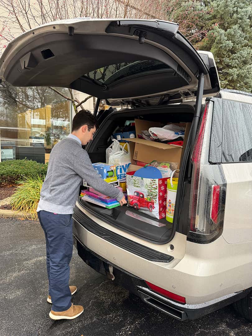 Patrick Cadillac staff contributing toys to support the Schaumburg Holiday Toy Drive.