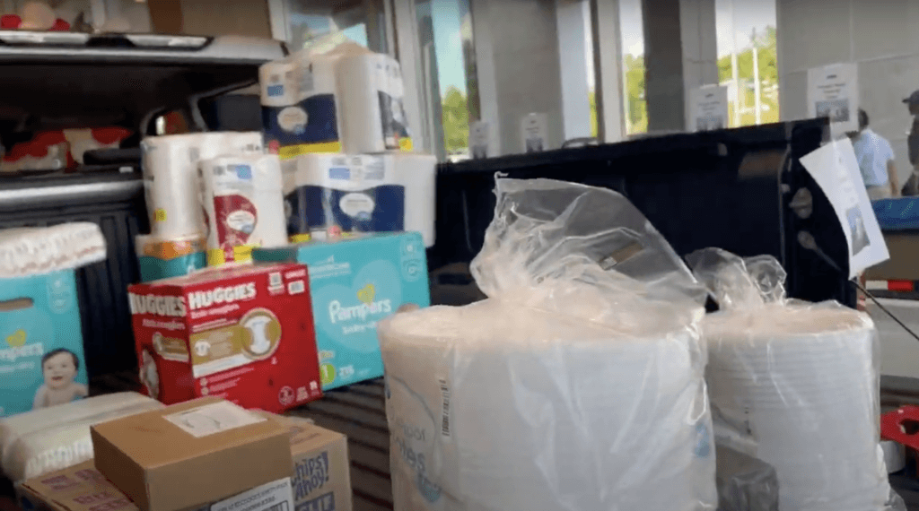 Pickup truck bed full of paper products and diapers to be delivered to Western NC
