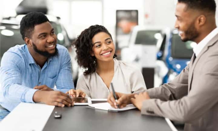 couple talking with salesperson