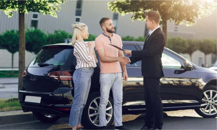 couple talking with salesperson