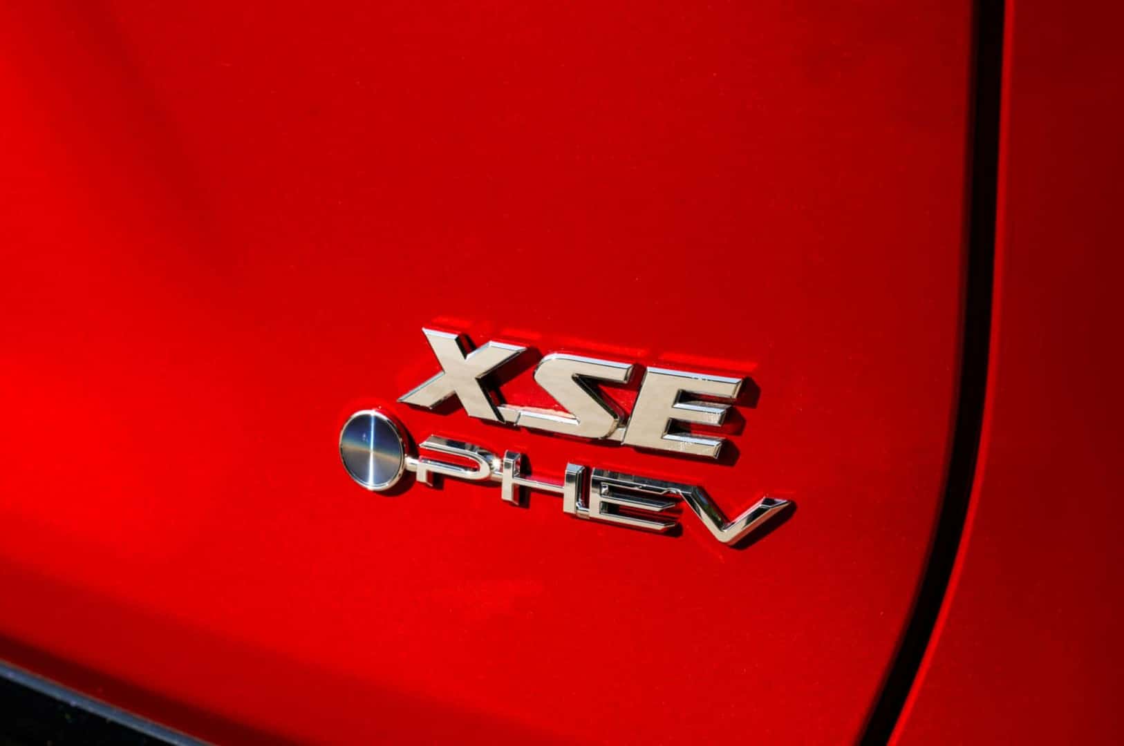 The Scarlet Exterior Of The Hybrid, The 2025 Toyota RAV4