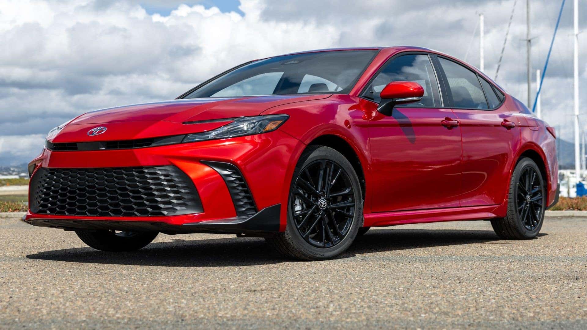 The Front Profile Of A Sexy Red 2025 Toyota Camry