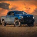 The Victorious And Praised Chevy Silverado, In A Desert At Sundown