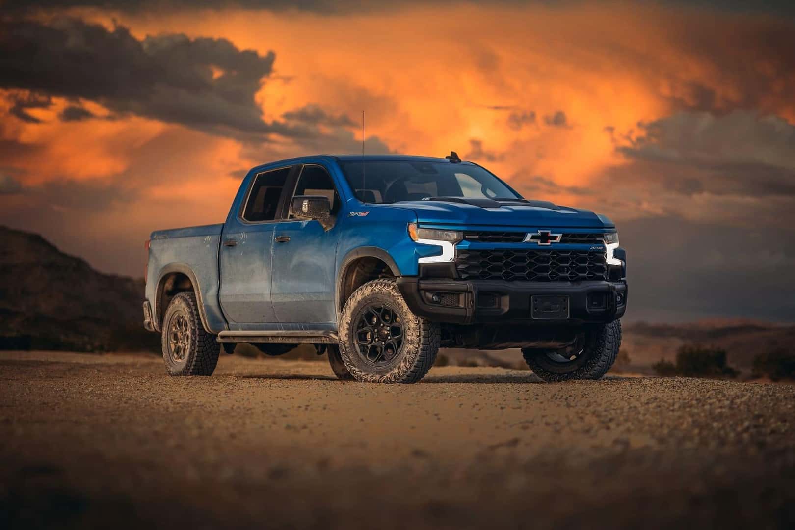 The Victorious And Praised Chevy Silverado, In A Desert At Sundown