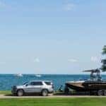 The Pristine 2021 GMC Yukon Denali Towing A Boat For The Next Adventure