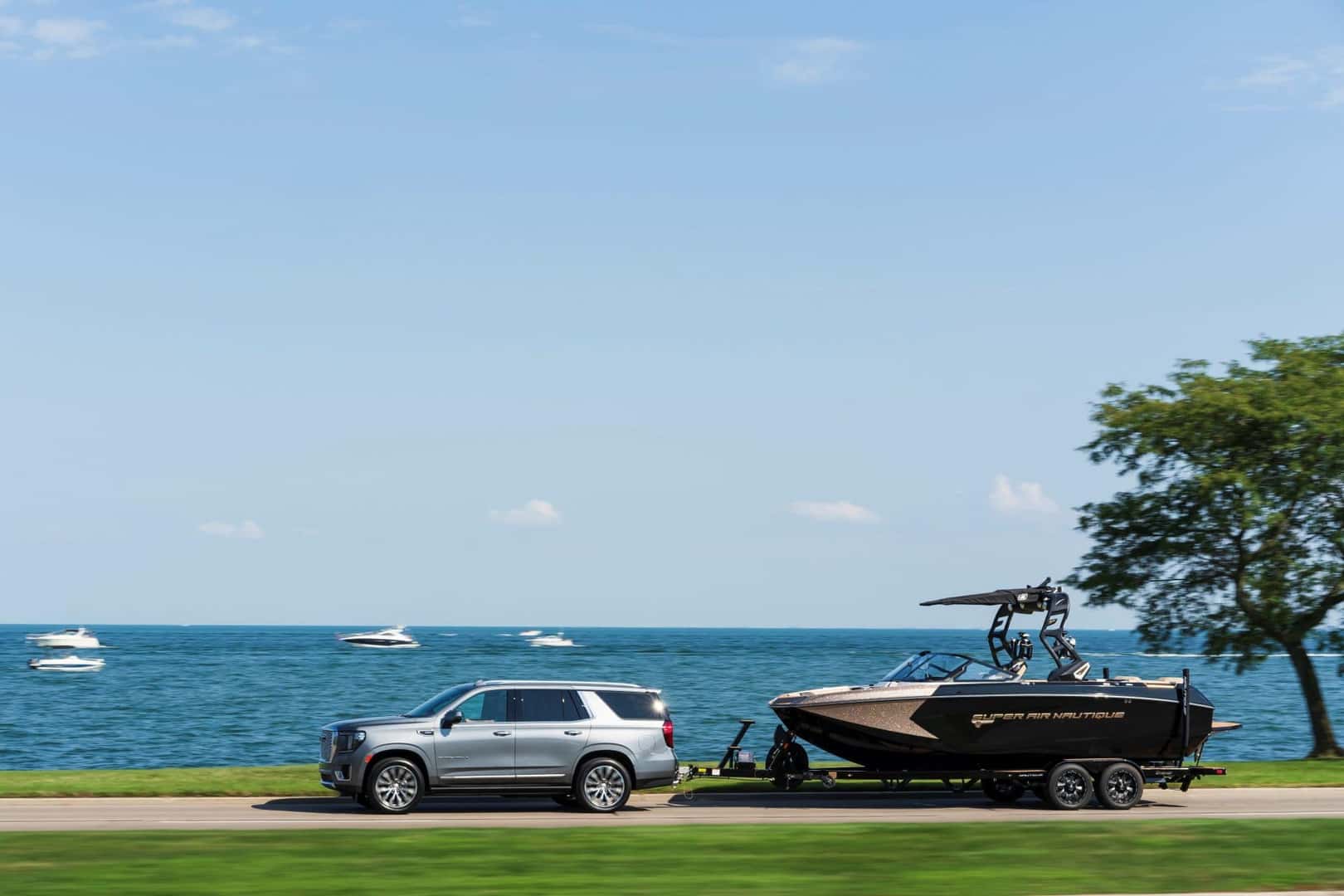 The Pristine 2021 GMC Yukon Denali Towing A Boat For The Next Adventure