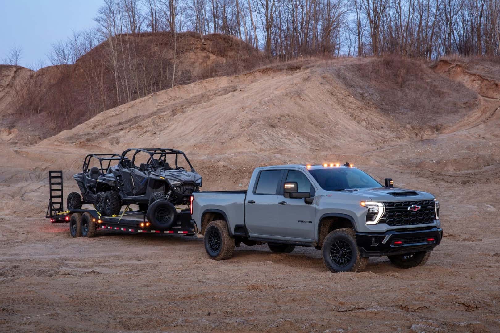 The Powerful And Potent 2024 Chevy Silverado HD Towing A Smaller Vehicle