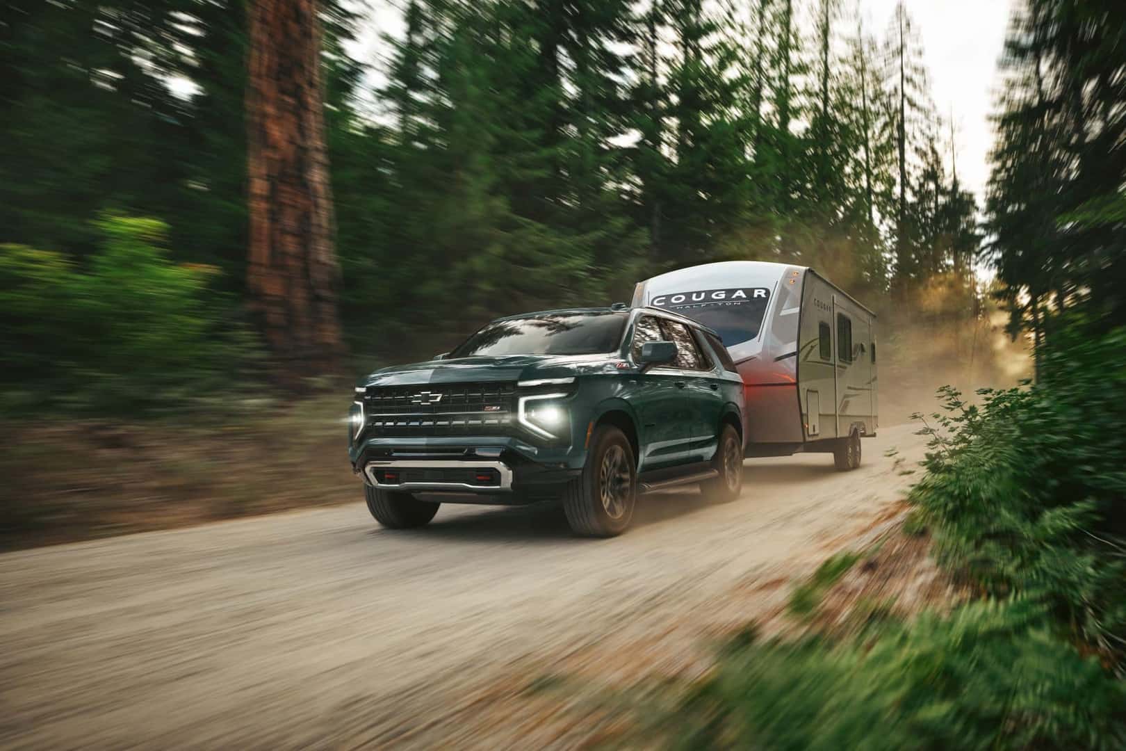 The Robust And Gorgeous 2025 Chevrolet Tahoe Towing A Cougar Trailer