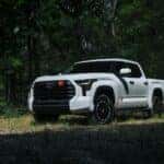 The Flexible And Turbo-Charged 2025 Toyota Tundra TRD Rally Package, Parked At The Tree Line