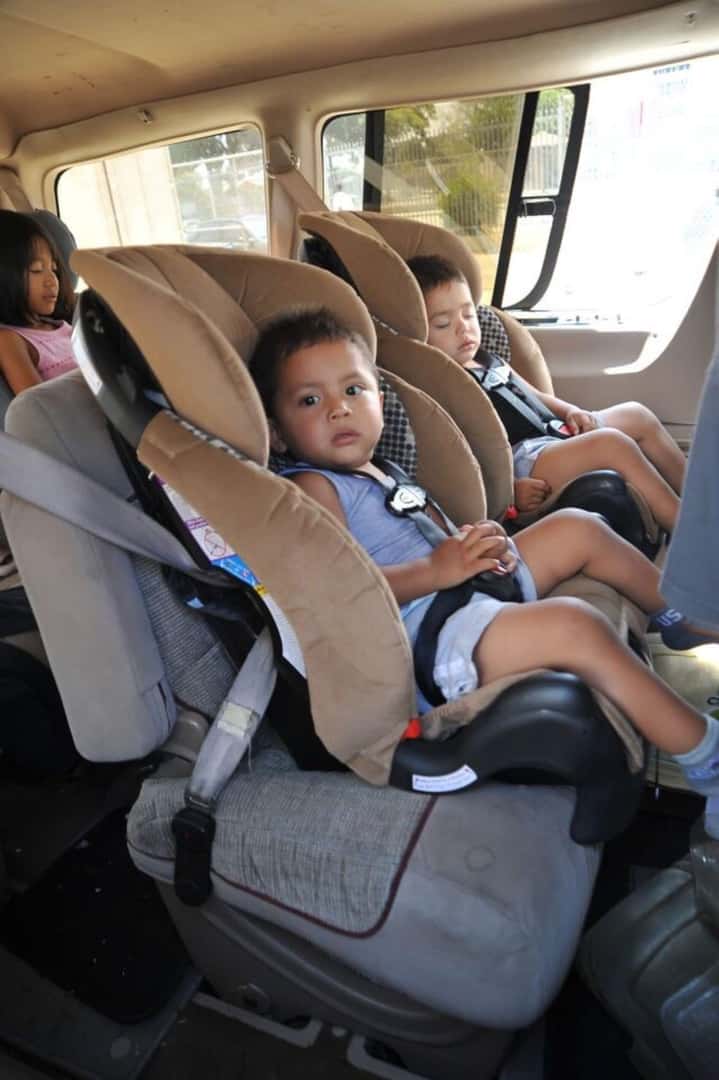 Cute Babies Secured In Their Car Seats, One Fast Asleep Napping Thanks To The Comfort Of The Toyota 4Runner