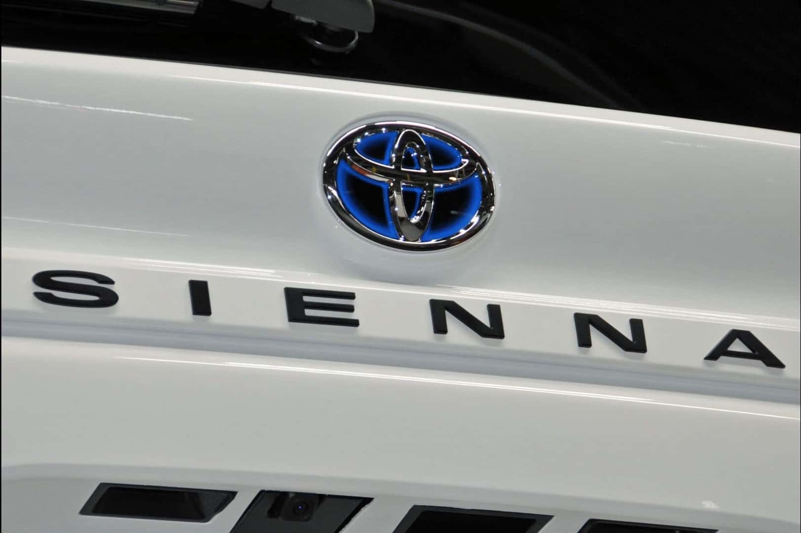 The Gorgeous And Shiny Toyota Logo And Sienna Words On The Back Of The Toyota Sienna