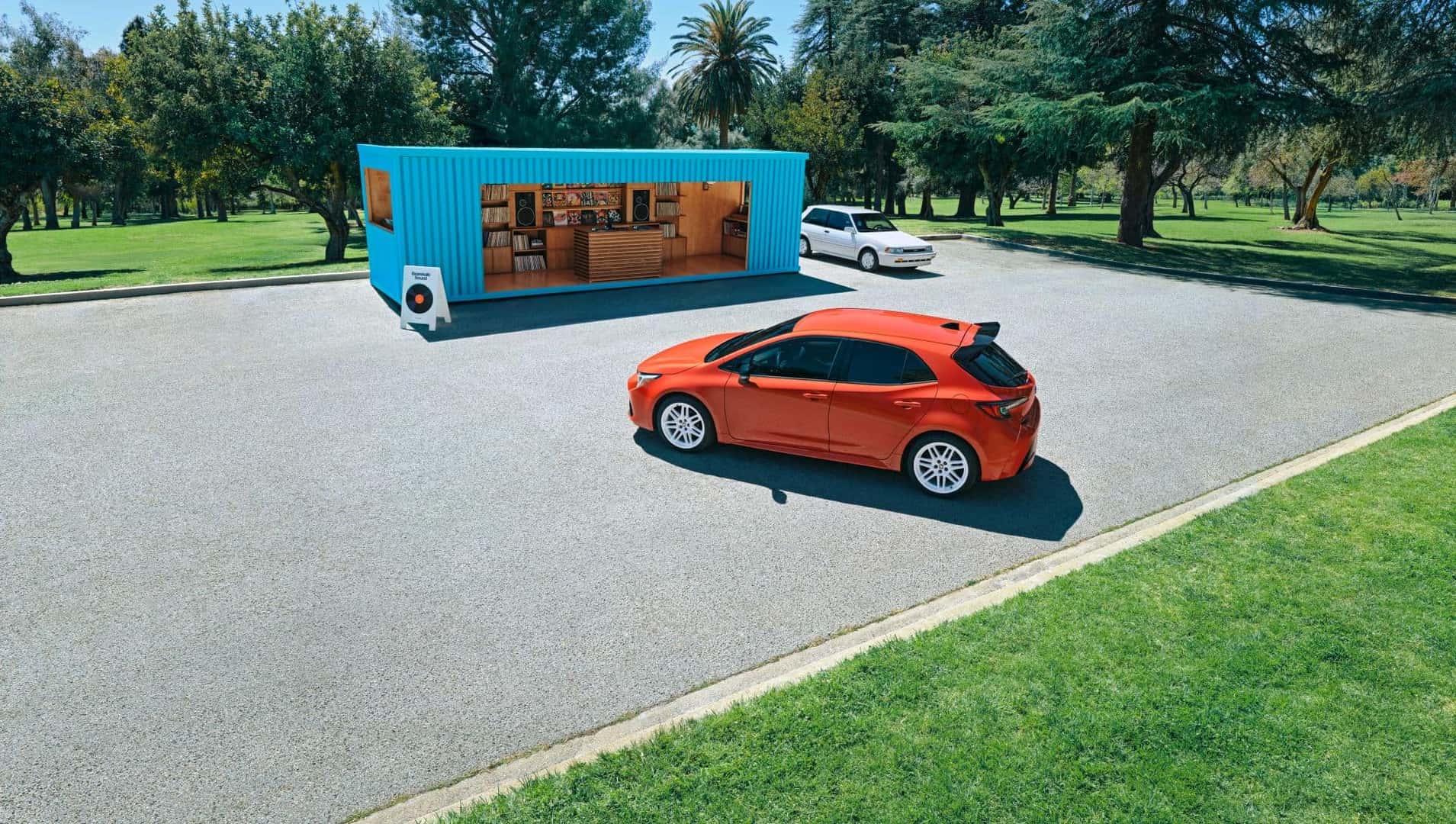 The Fabulous And Incredible 2026 Corolla Hatchback FX Driving Out Of A Parking Lot