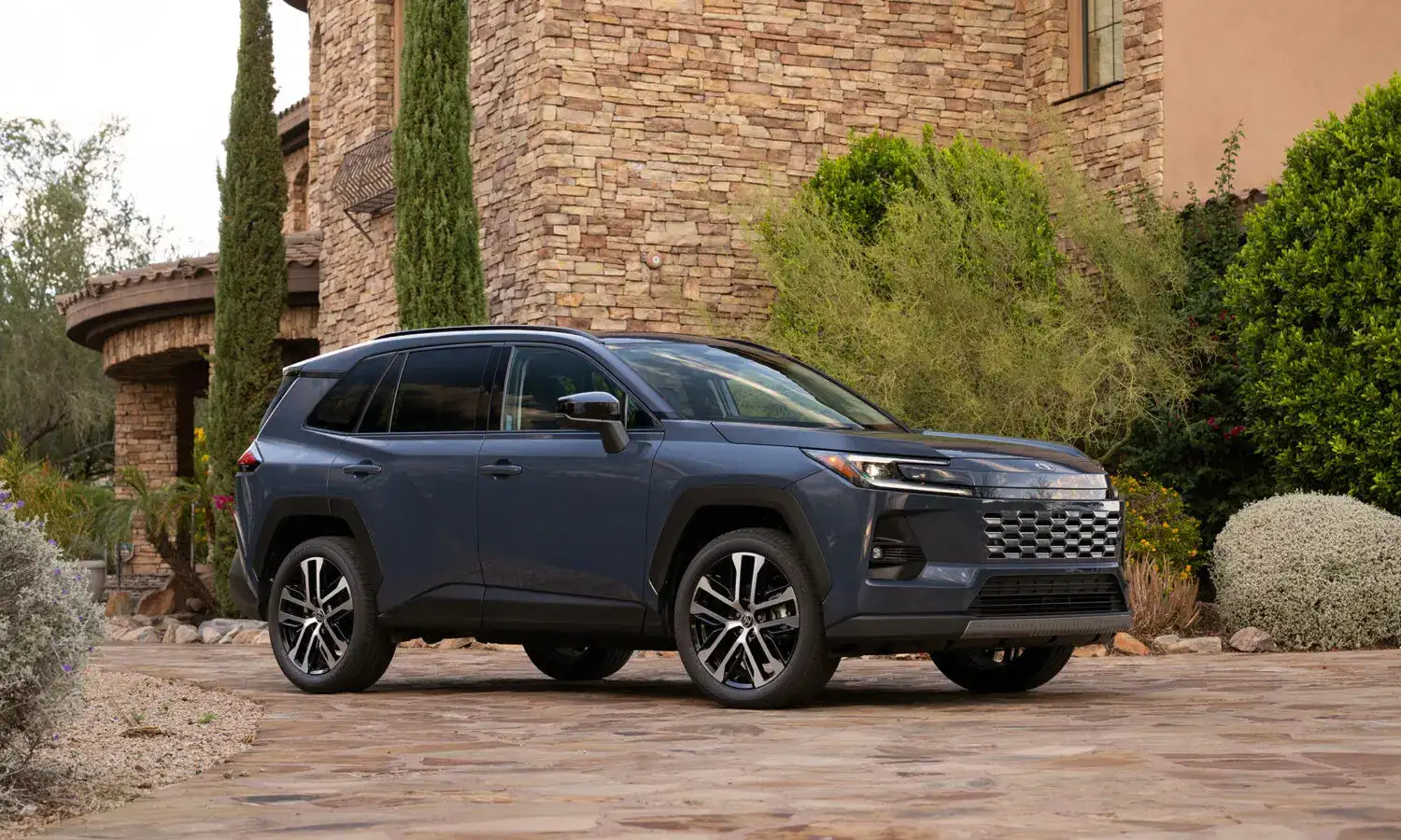 2026 Toyota Rav4 Limited side profile view parked off road