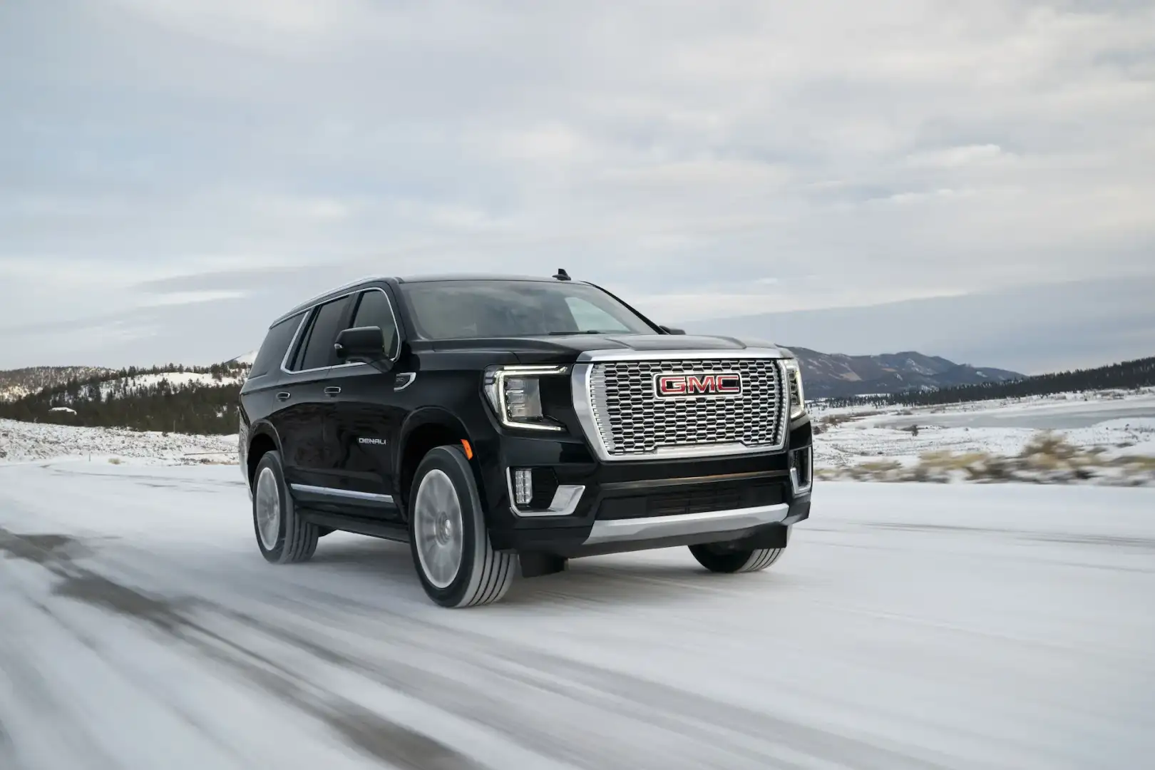 GMC Yukon Denali driving in the snow