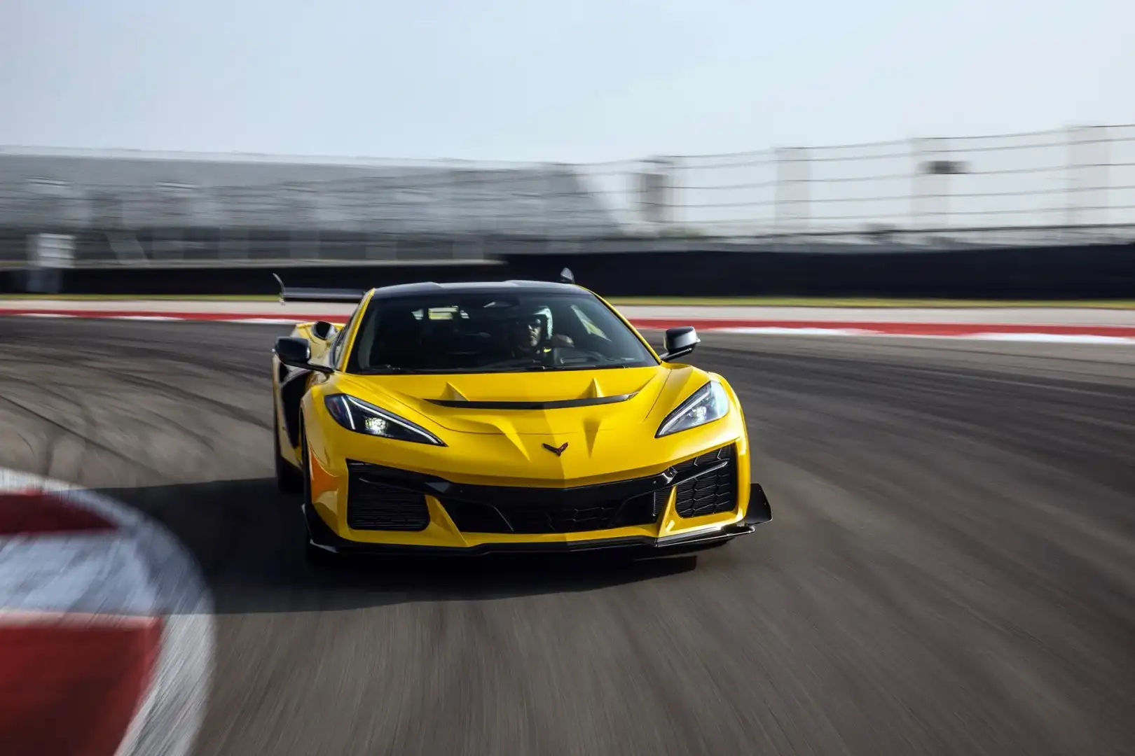 front view of the 2025 yellow Chevrolet Corvette ZR1 on a racetrack