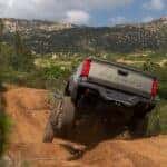 2026 Toyota Tacoma Trailhunter Bronze Oxide jumping hill