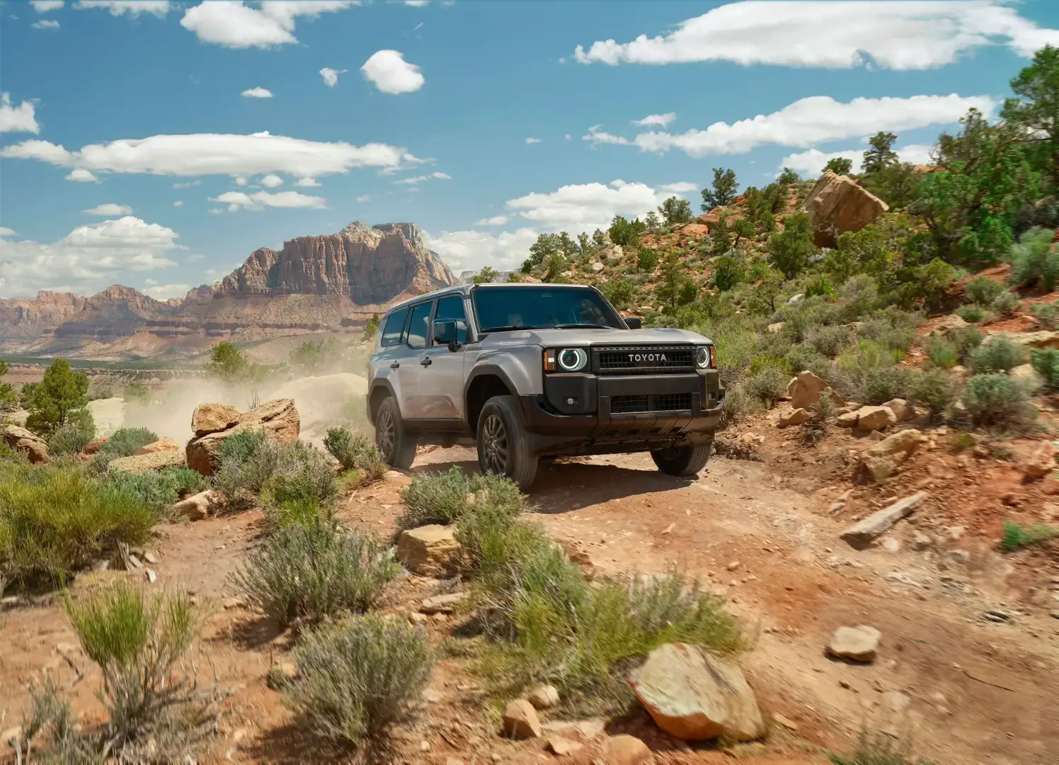 2026 Toyota Land Cruiser 1958 off roading on a dirt road