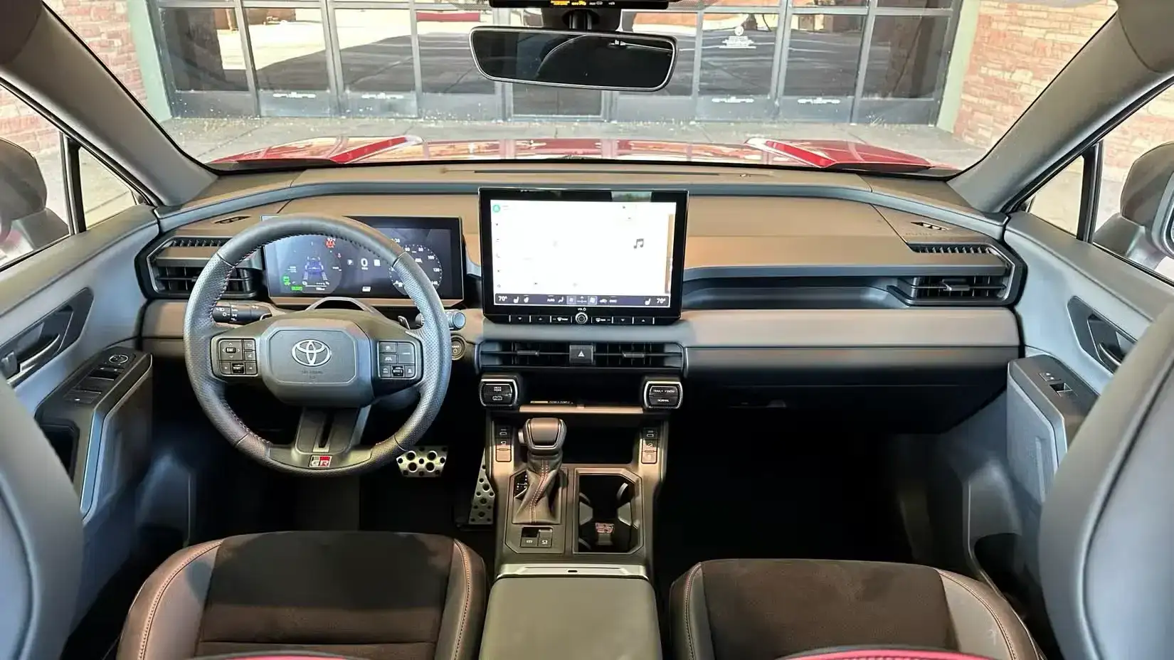 Interior view of the front in a 2025 Toyota Rav4 plug in Hybrid GR Sport