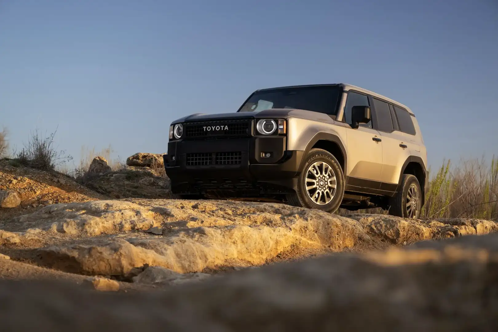 2026 Toyota Land Cruiser 1958 off roading on a mountain