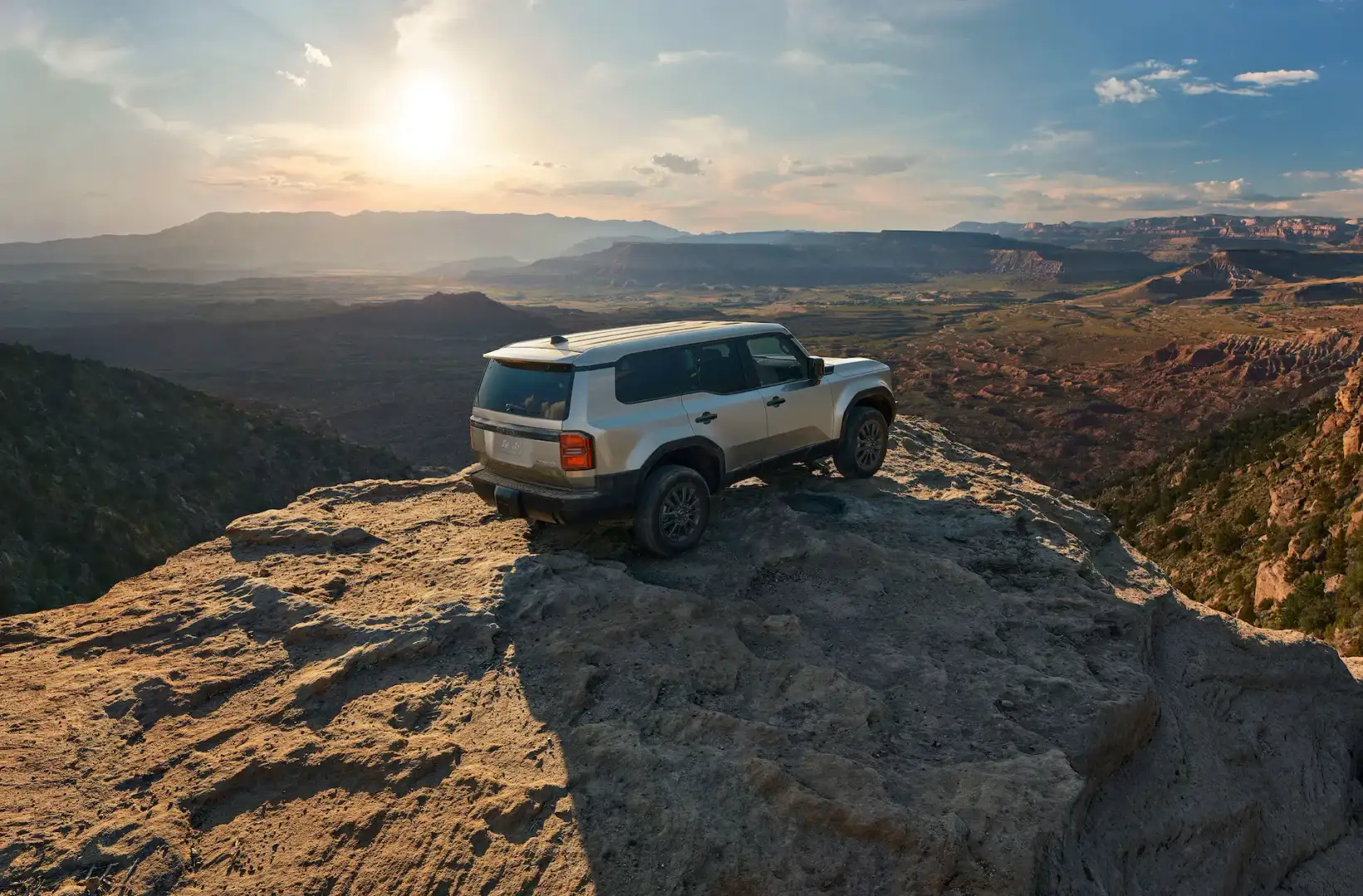 2026 Toyota Land Cruiser 1958 parked on top of a mountain