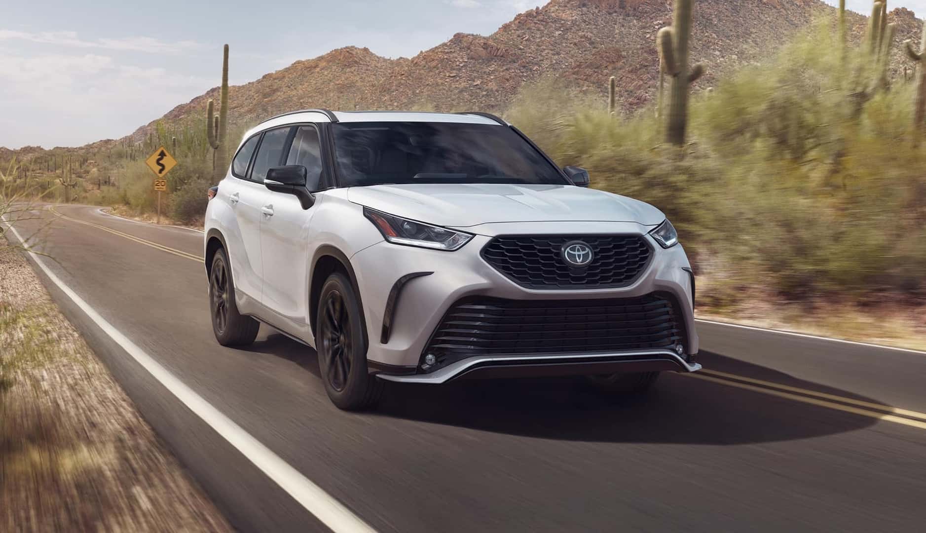 2026 Toyota Highlander White Driving