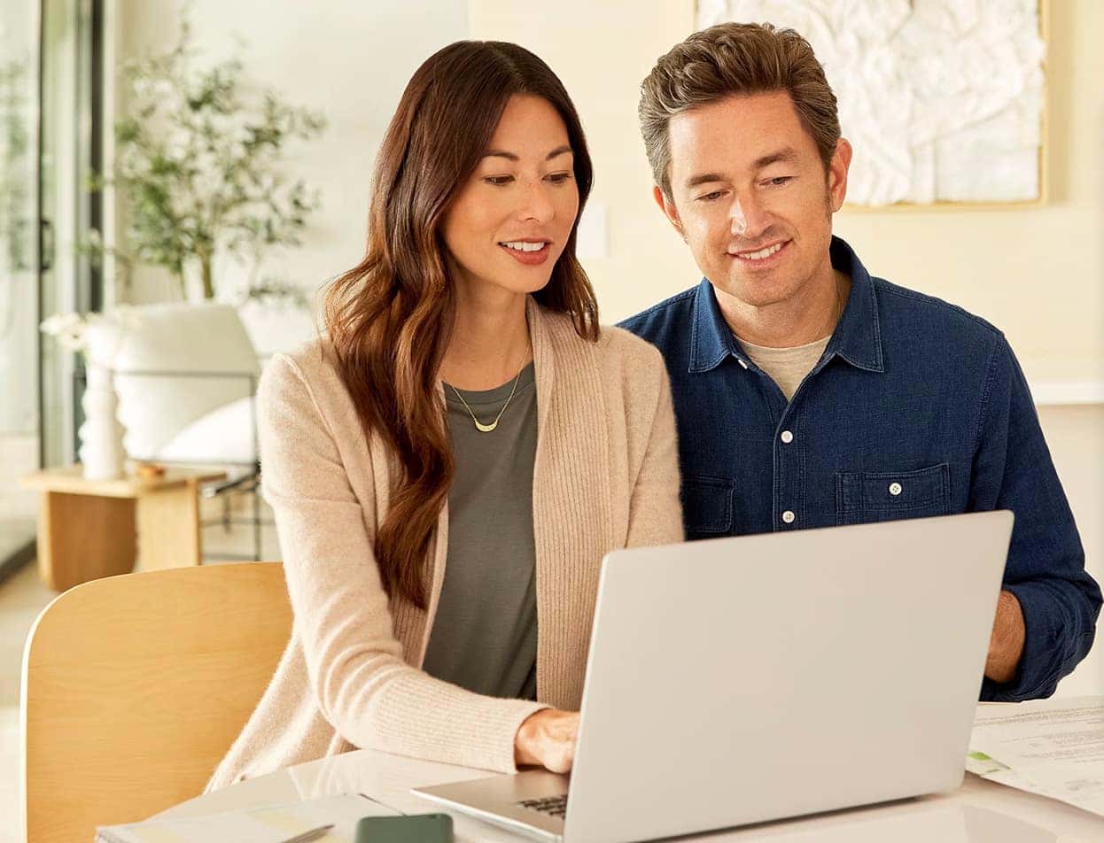 Couple purchasing a vehicle online