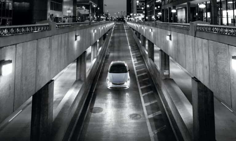 20Kia-Optima-ExteriorDrivingInTheCityBlackAndWhite-5x3
